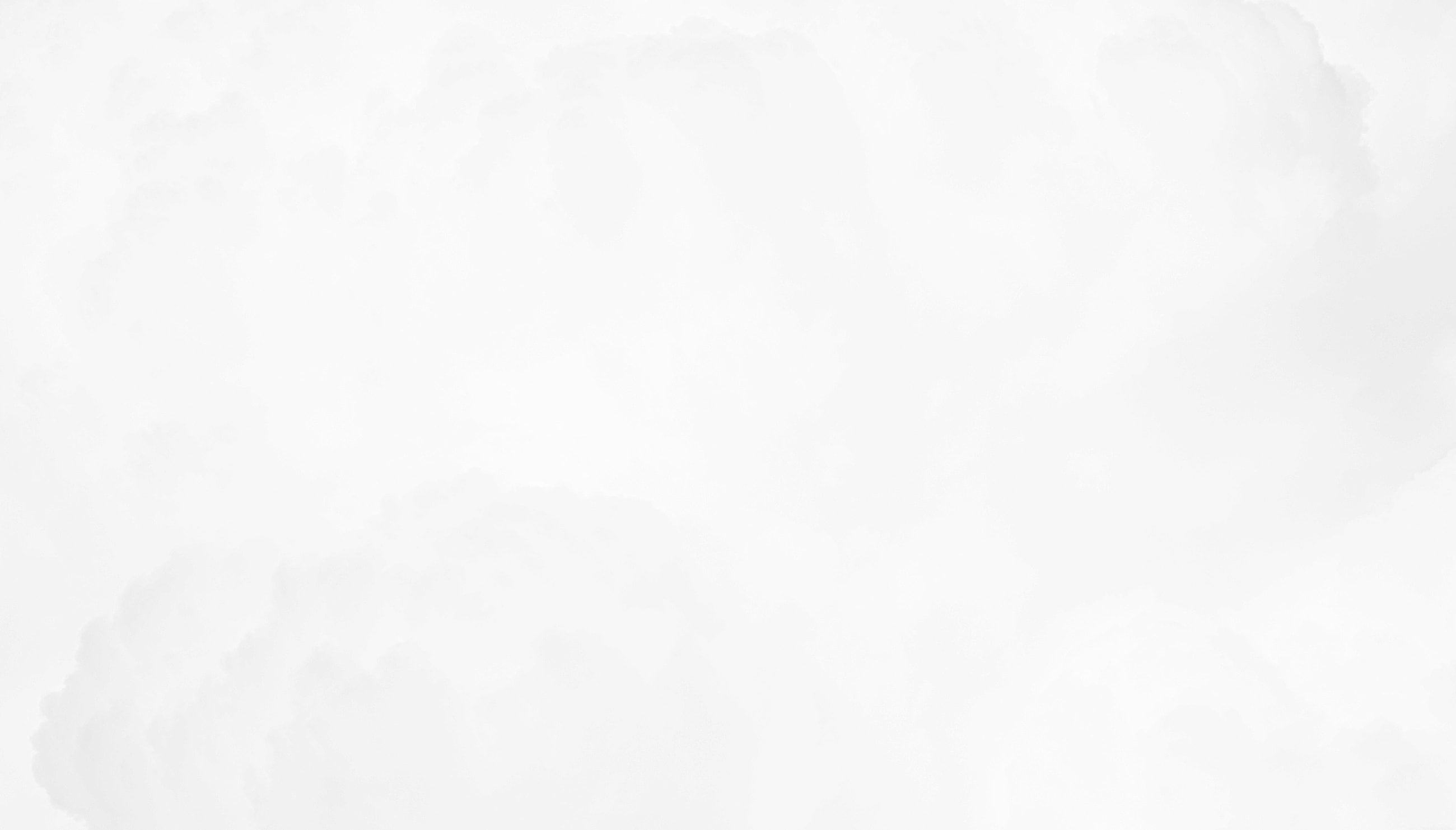 Soft, cloudy white abstract background texture.