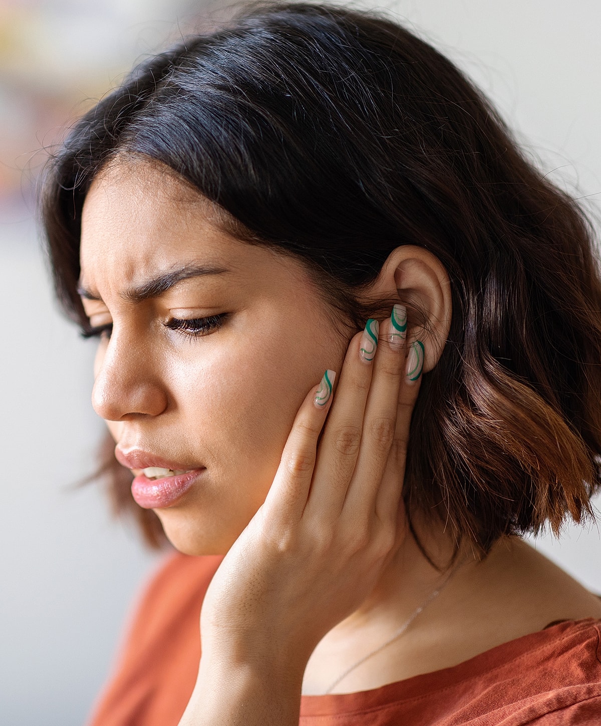 Facial grooming session between two individuals.