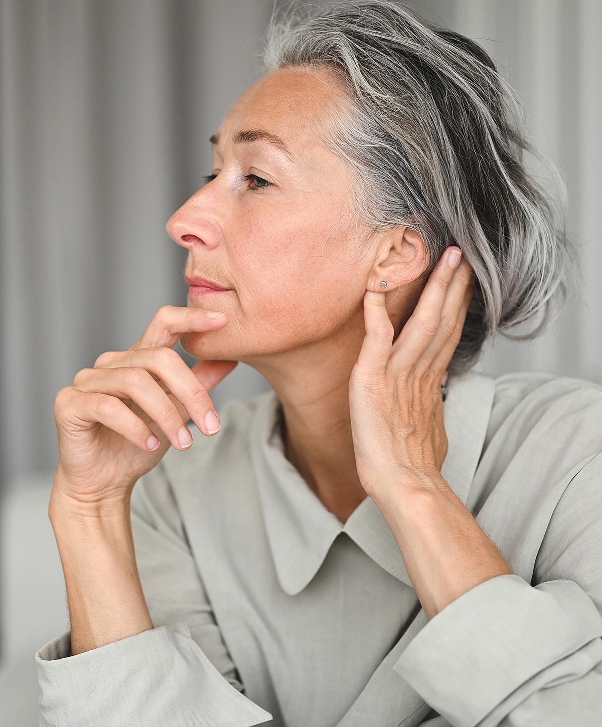 Facial grooming session between two individuals.