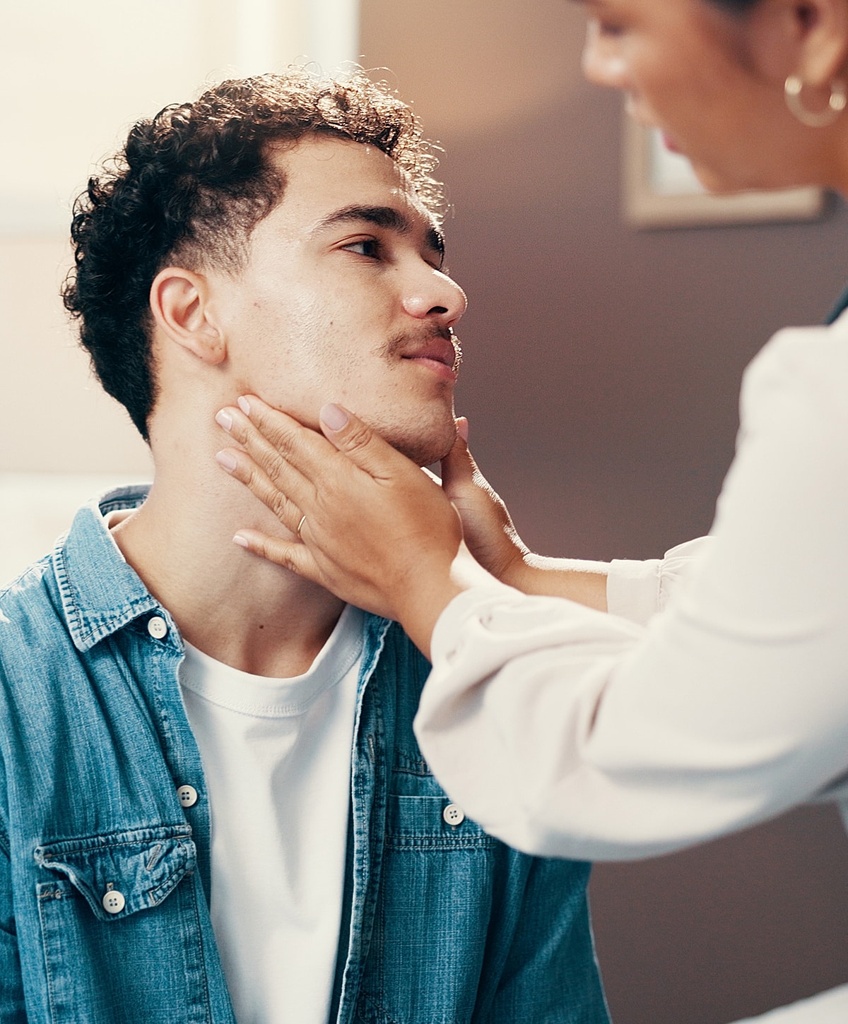 Facial grooming session between two individuals.