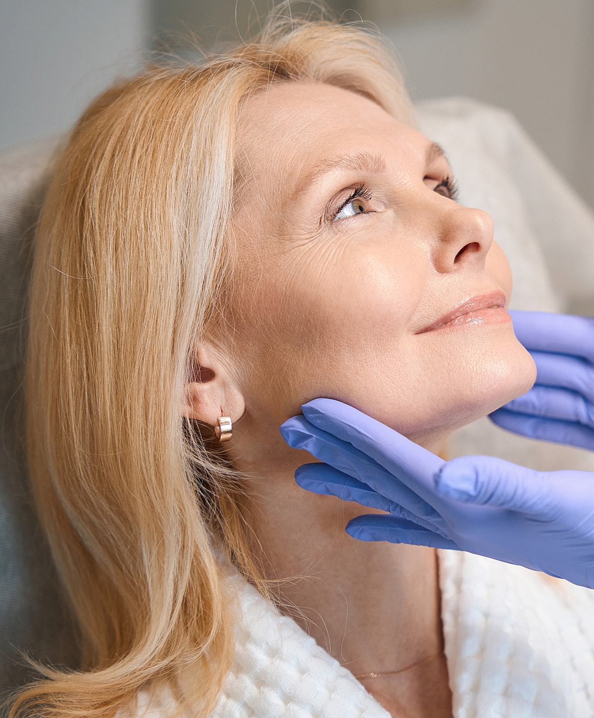 Facial grooming session between two individuals.