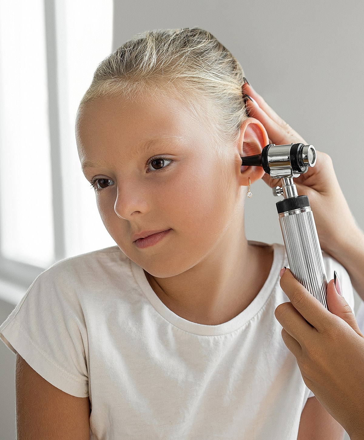 Facial grooming session between two individuals.