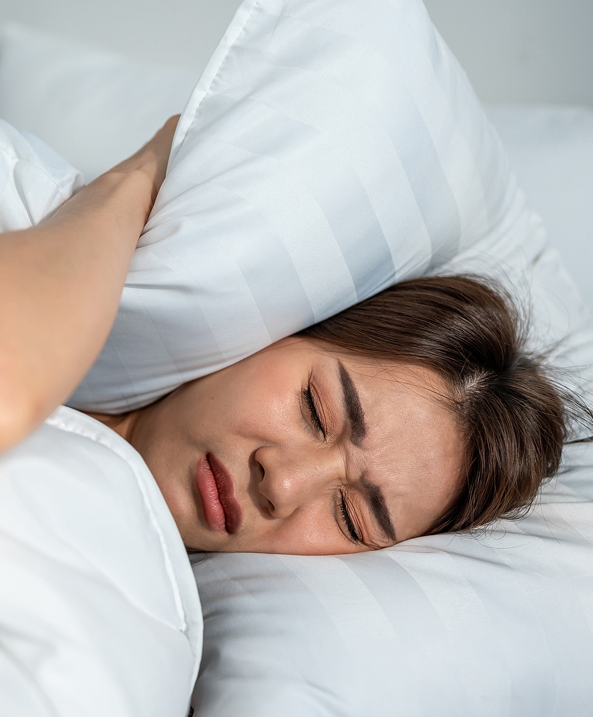 Facial grooming session between two individuals.