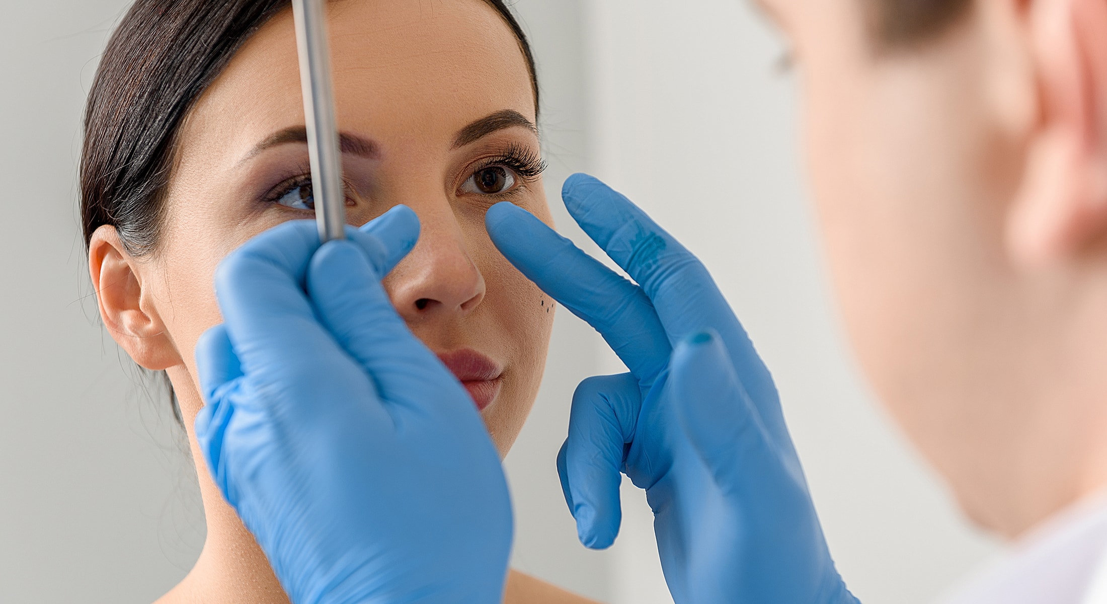 Facial examination with a medical professional.